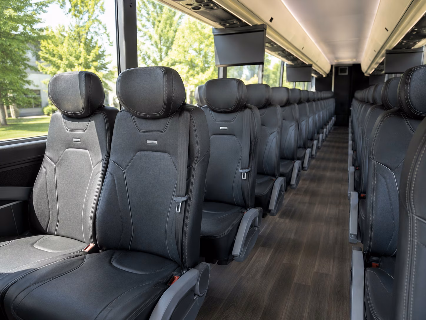 hotel and airport charter bus rentals for fort smith wedding guests